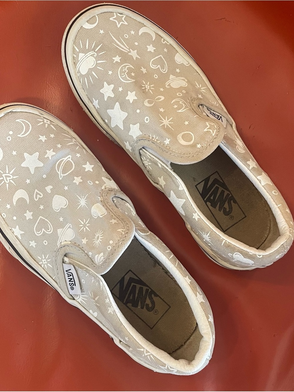 Vans Kids Slip-On Sneakers in Beige with White Space Print
